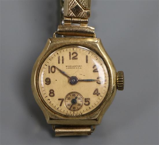 A ladys 9ct gold wrist watch.